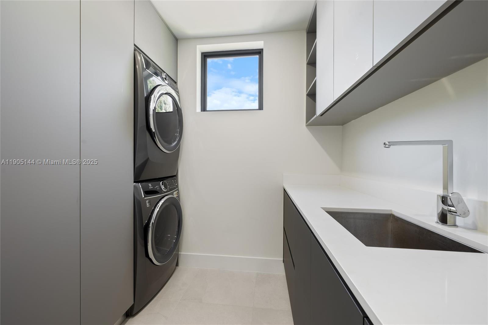 2127 Southwest 11th Terrace Miami, FL 33135 - Photo 26 of 28 a utility room with dryer and washer