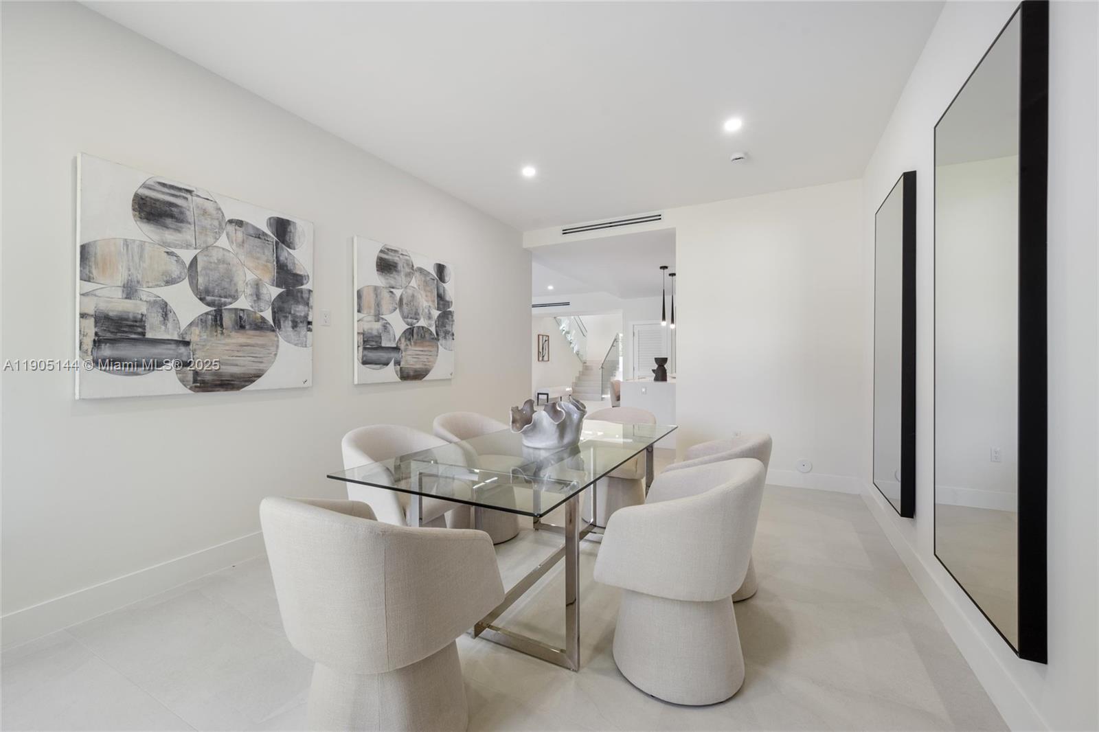 2127 Southwest 11th Terrace Miami, FL 33135 - Photo 10 of 28 a dining room with furniture and wooden floor