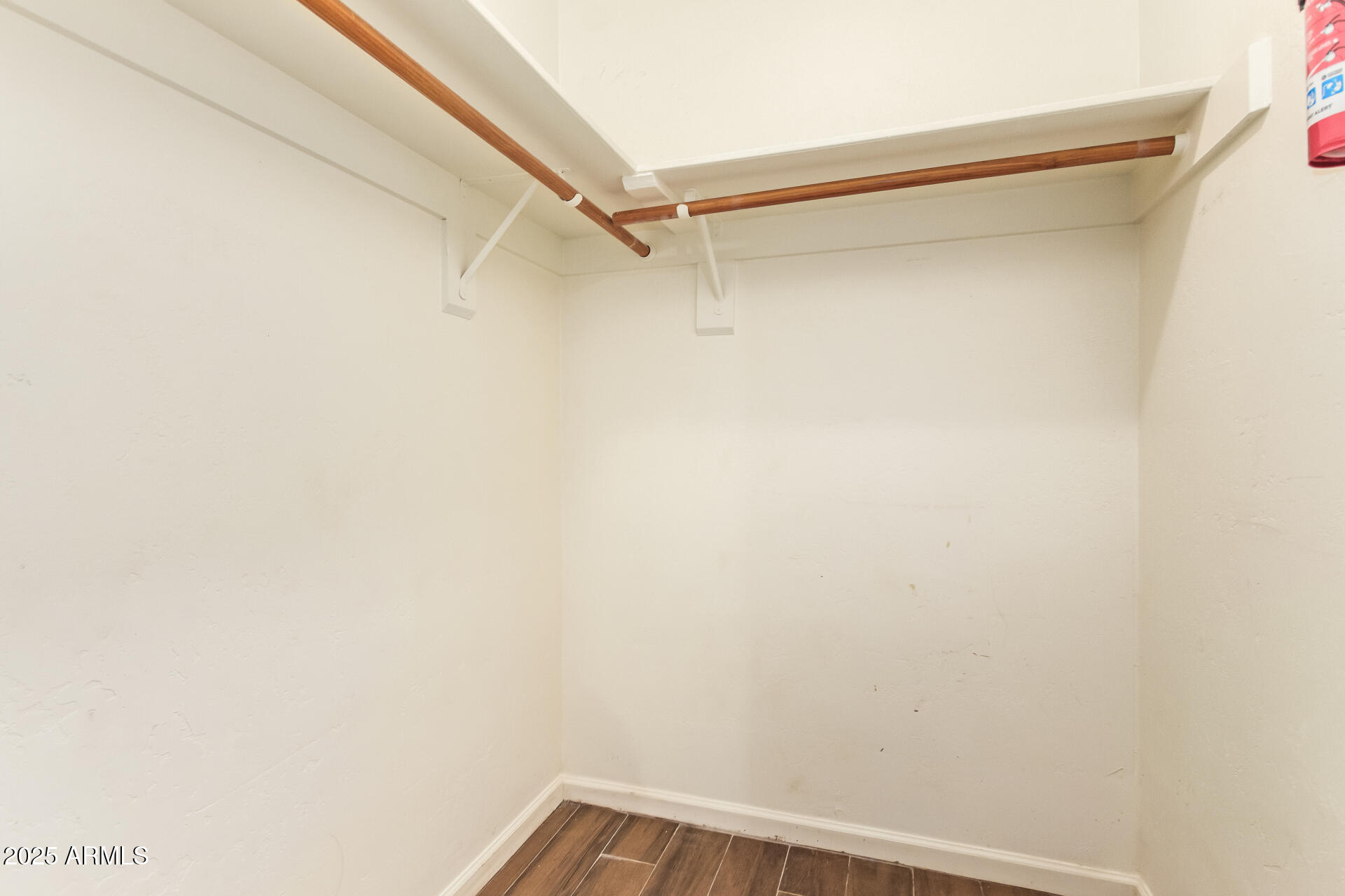 151 East Broadway Road, Unit 103 Tempe, AZ 85282 - Photo 21 of 27 a view of a room with shelf