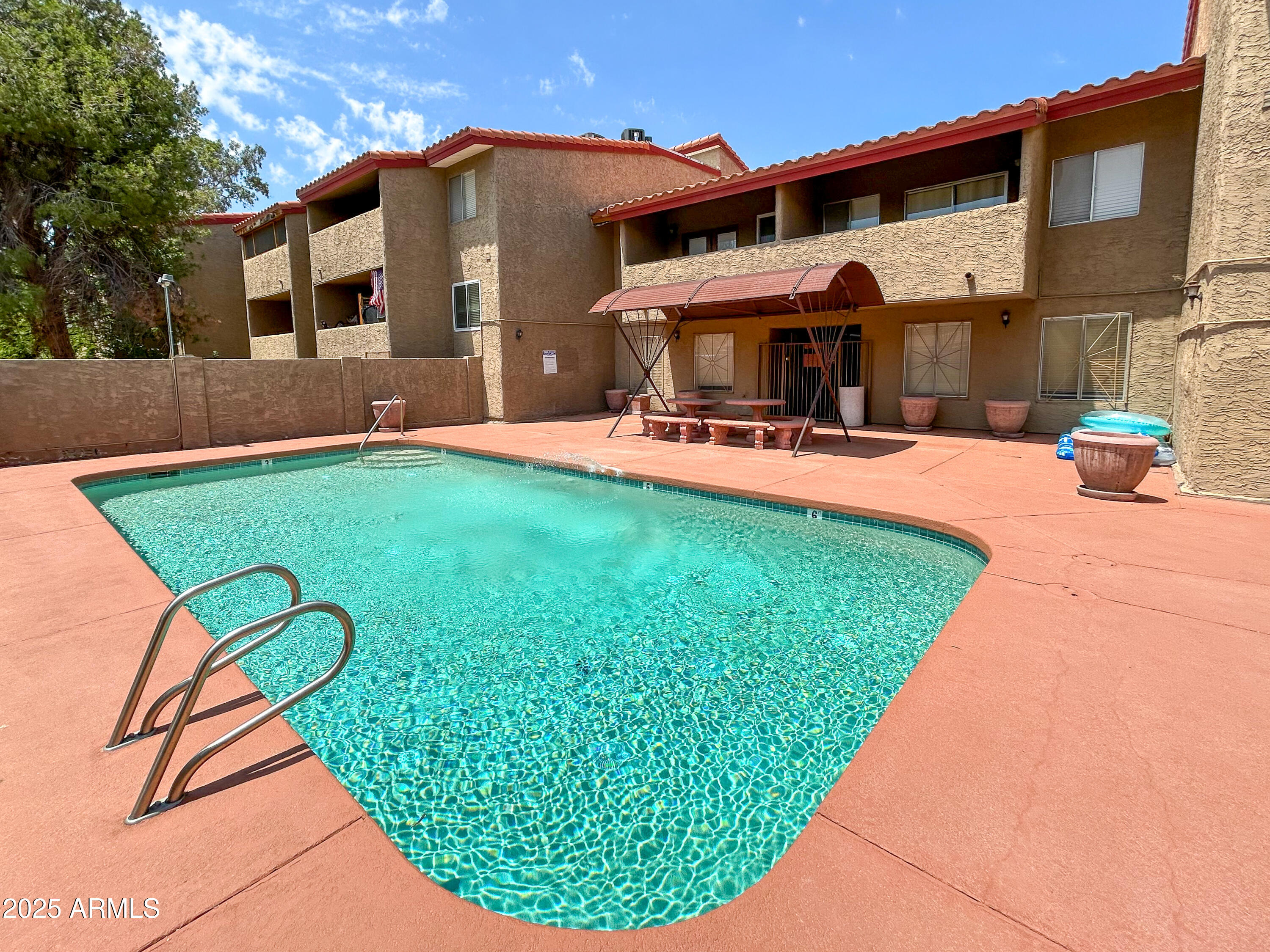 151 East Broadway Road, Unit 103 Tempe, AZ 85282 - Photo 33 of 33 a front view of house with yard and outdoor seating