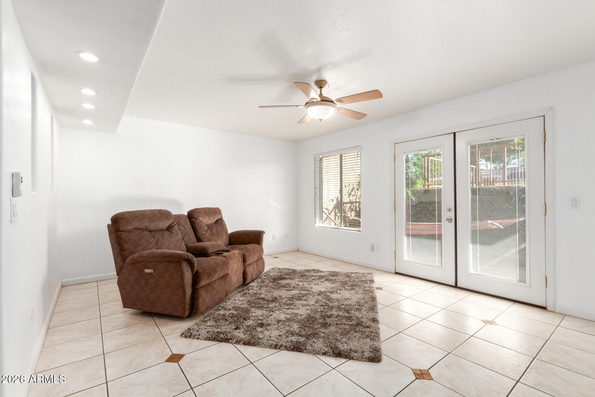 151 East Broadway Road, Unit 103 Tempe, AZ 85282 - Photo 7 of 33 a living room with furniture