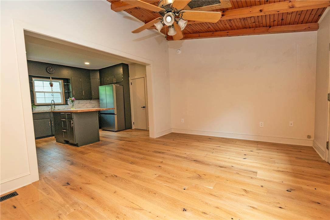 100 Creek Road Bangor, PA 18013 - Photo 34 of 51 Warm wood flooring extends throughout this inviting open-concept living space with a modern kitchen.