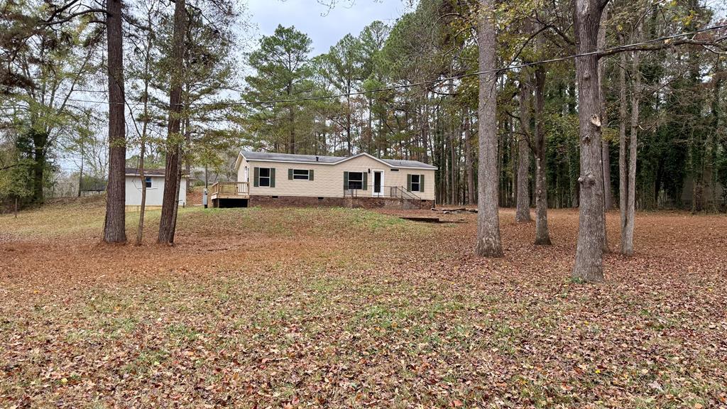 301 Satellite Circle Fortson, GA 31808 - Photo 1 of 24 a backyard of a house with lots of green space