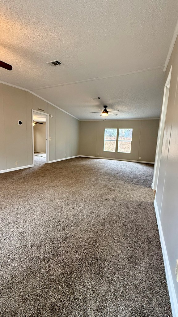 301 Satellite Circle Fortson, GA 31808 - Photo 14 of 24 a view of an empty room with a window
