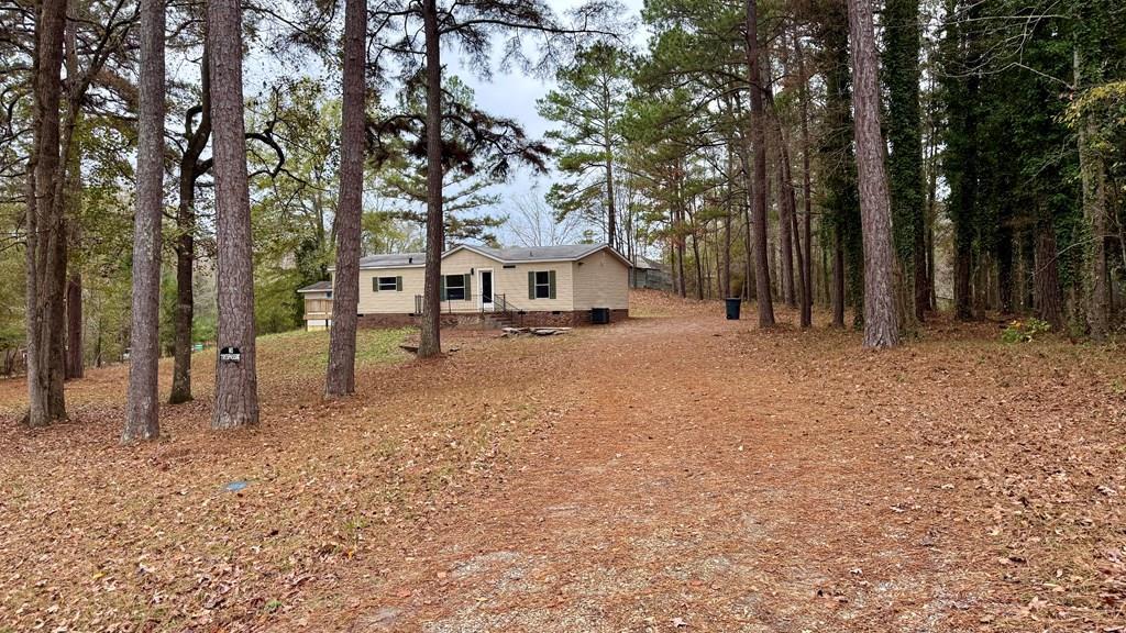 301 Satellite Circle Fortson, GA 31808 - Photo 2 of 24 a view of a outdoor space with a tree