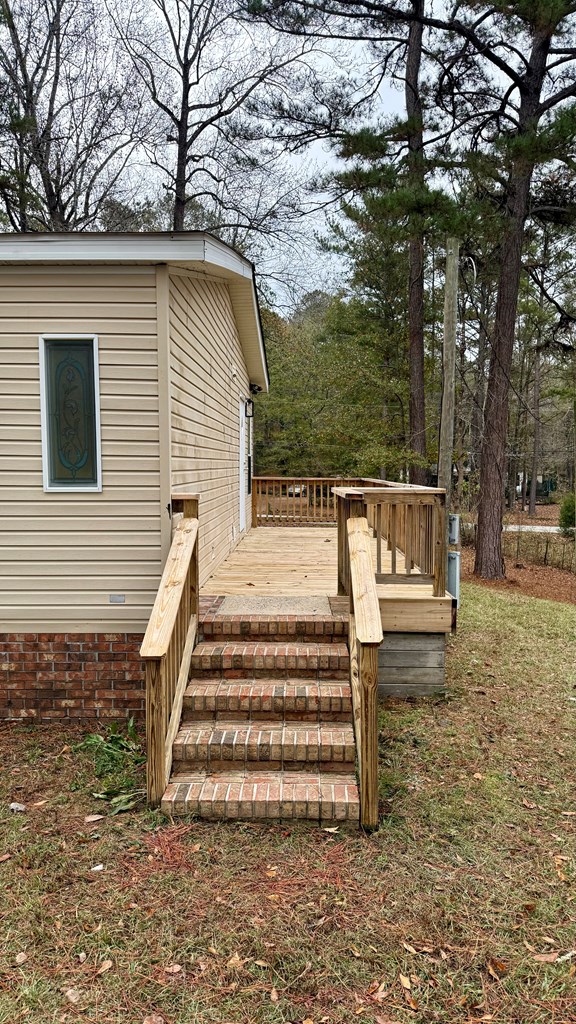 301 Satellite Circle Fortson, GA 31808 - Photo 23 of 24 a view of backyard with trees