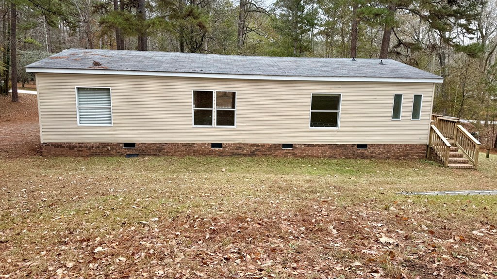 301 Satellite Circle Fortson, GA 31808 - Photo 24 of 24 a view of a house with a yard