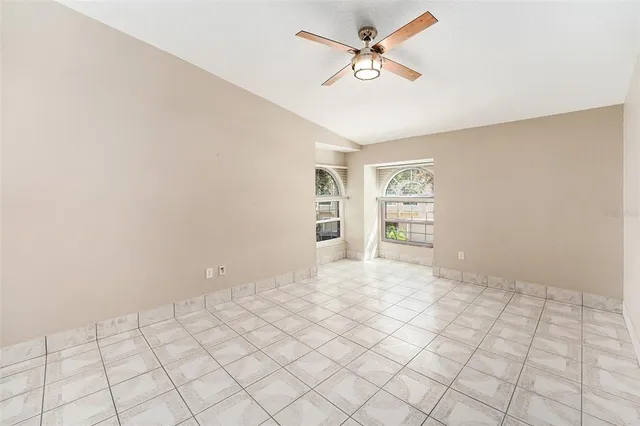 a white toilet sitting next to a shower