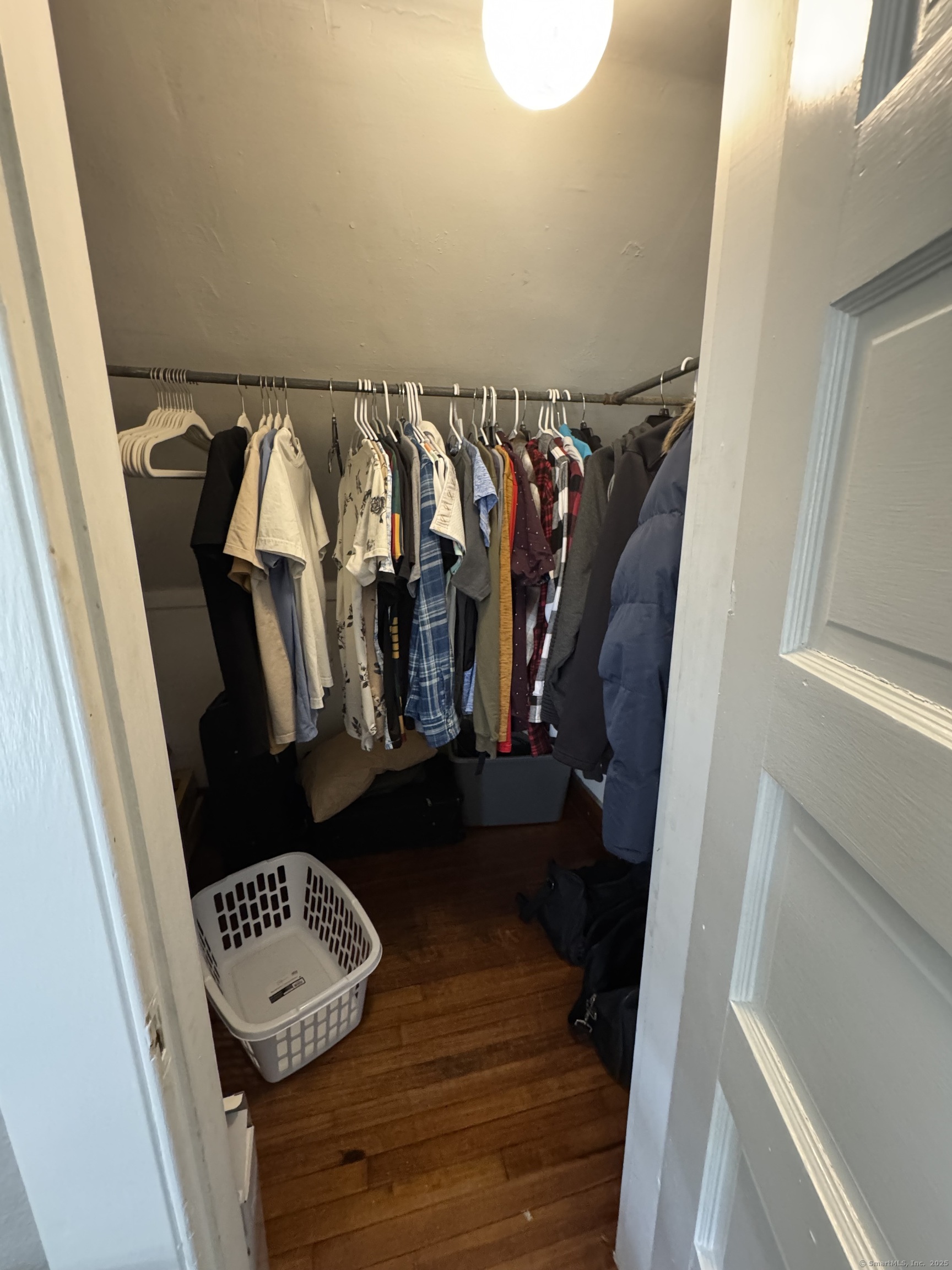 856 New Haven Road Naugatuck, CT 06770 - Photo 31 of 36 a view of walk in closet with clothes and shoes