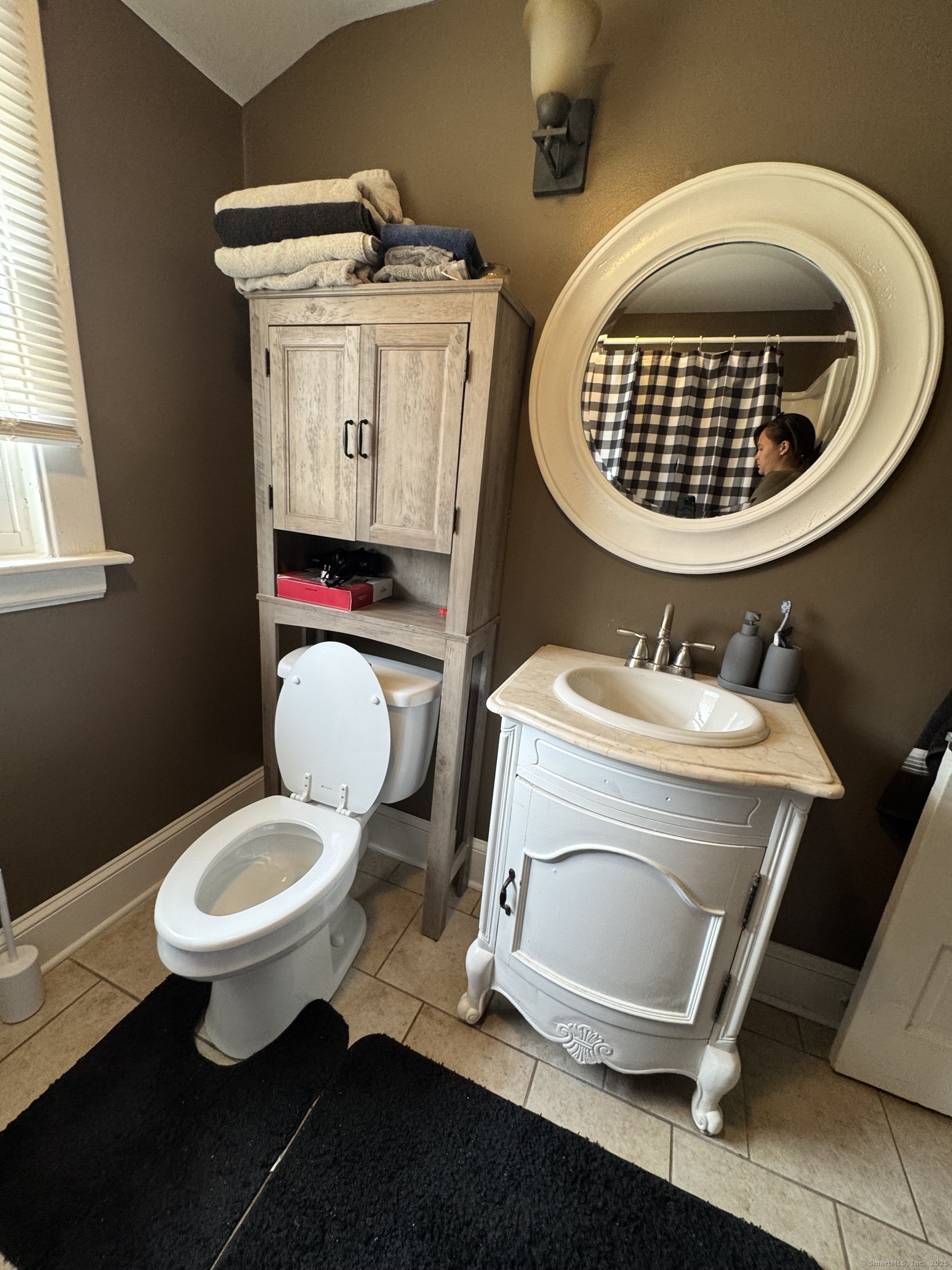 856 New Haven Road Naugatuck, CT 06770 - Photo 33 of 36 a bathroom with a toilet a sink and a window