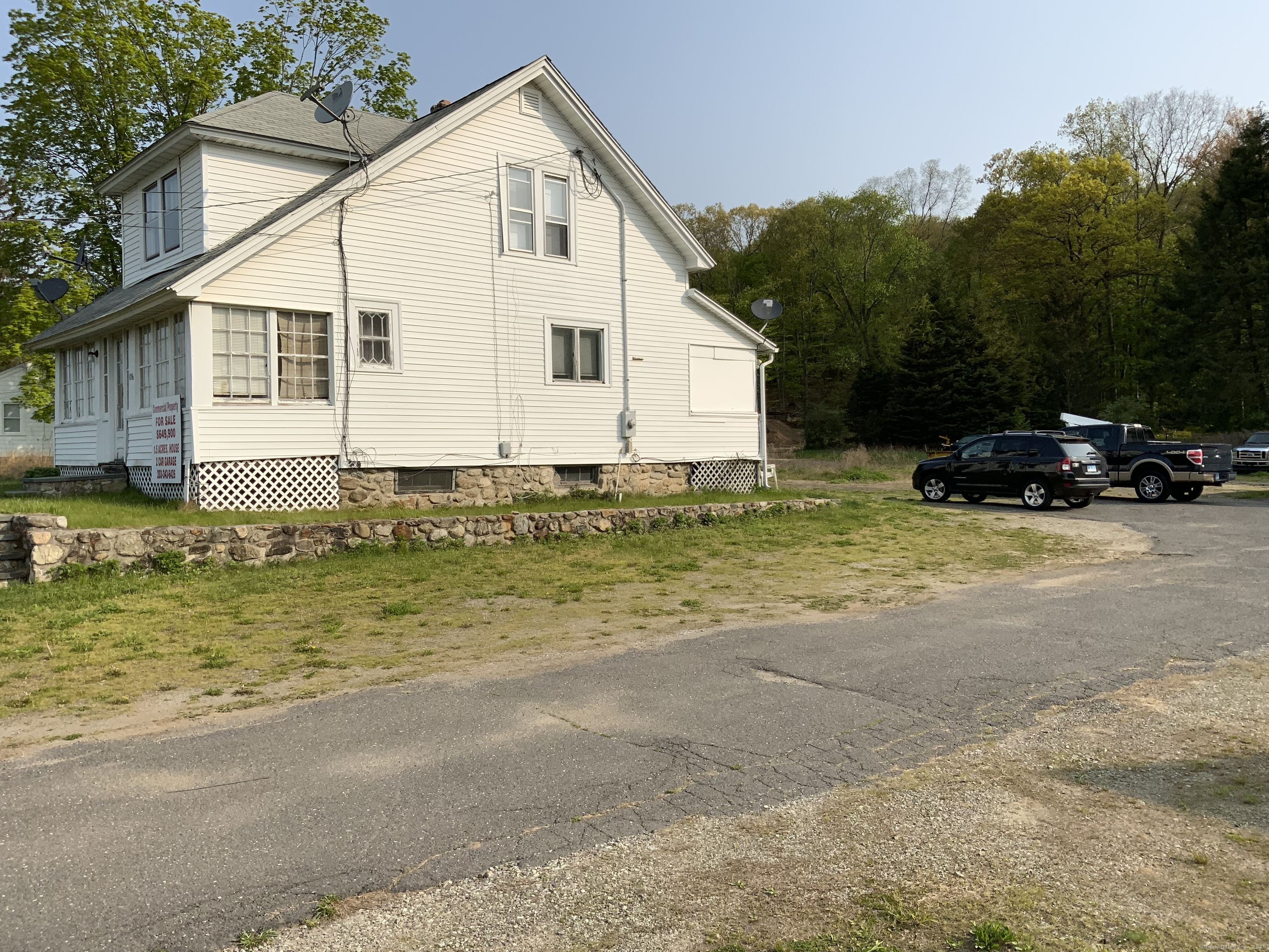 856 New Haven Road Naugatuck, CT 06770 - Photo 9 of 36 a view of a house with a yard