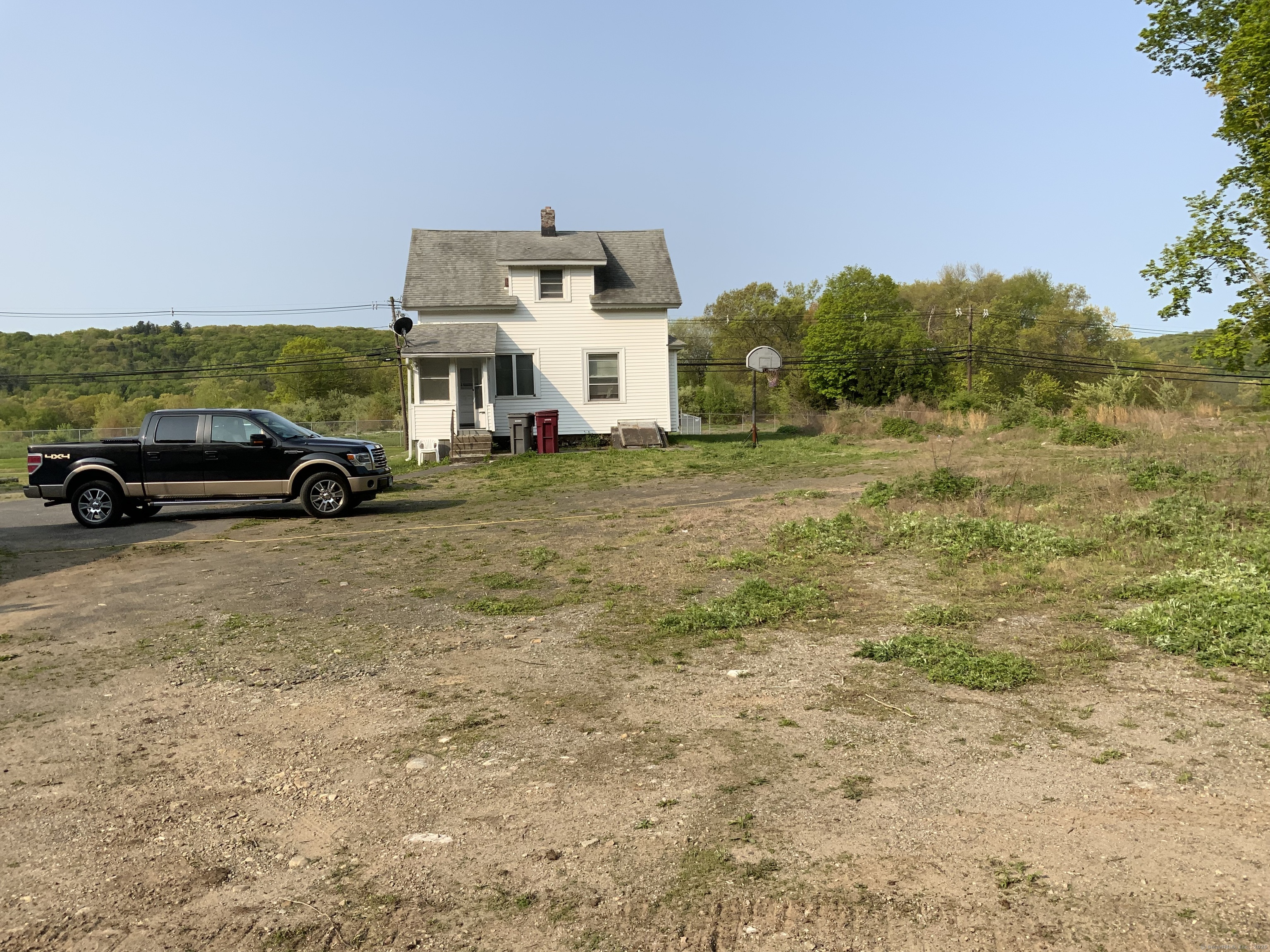 856 New Haven Road Naugatuck, CT 06770 - Photo 10 of 36 a view of a car in front of a road