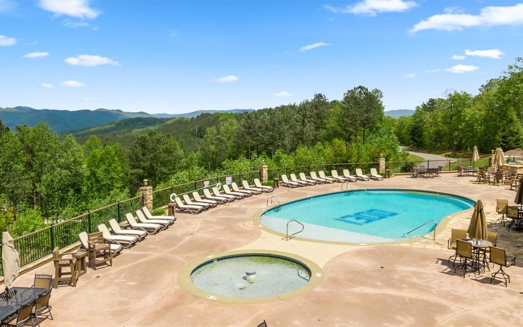 Lt158 Stables Loop Blairsville, GA 30512 - Photo 24 of 42 a view of a swimming pool with a yard and mountain view