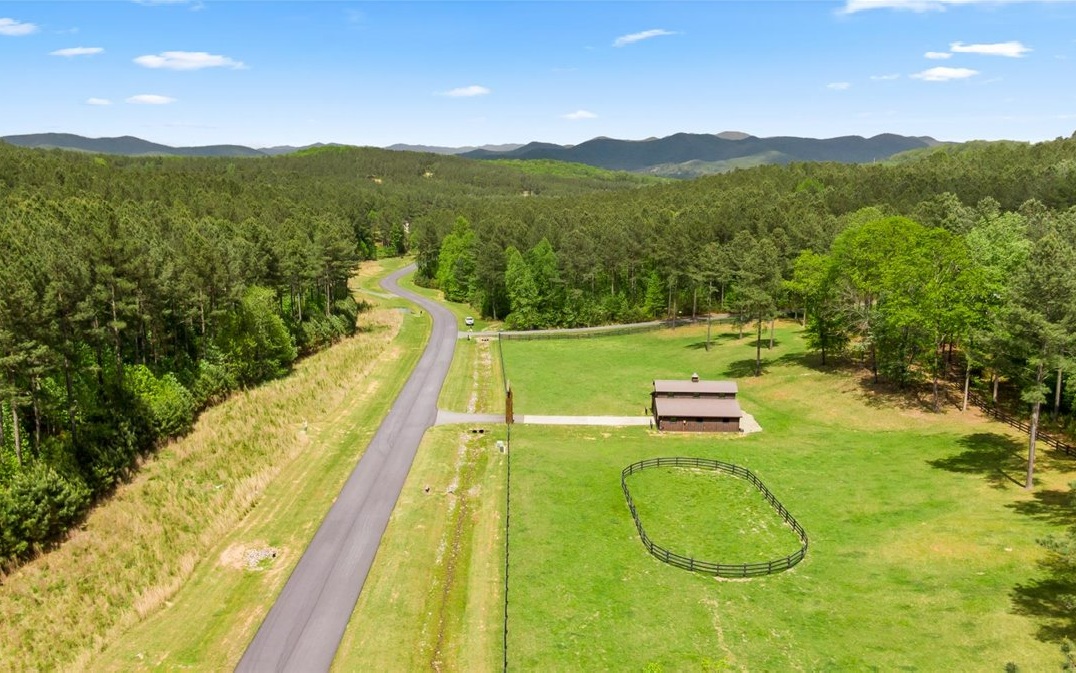 Lt158 Stables Loop Blairsville, GA 30512 - Photo 25 of 42 a view of a swimming pool with a lake and mountain view