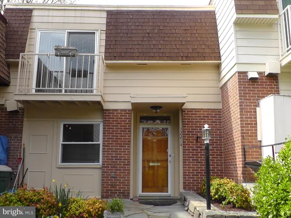 a view of front door of house with an entrance