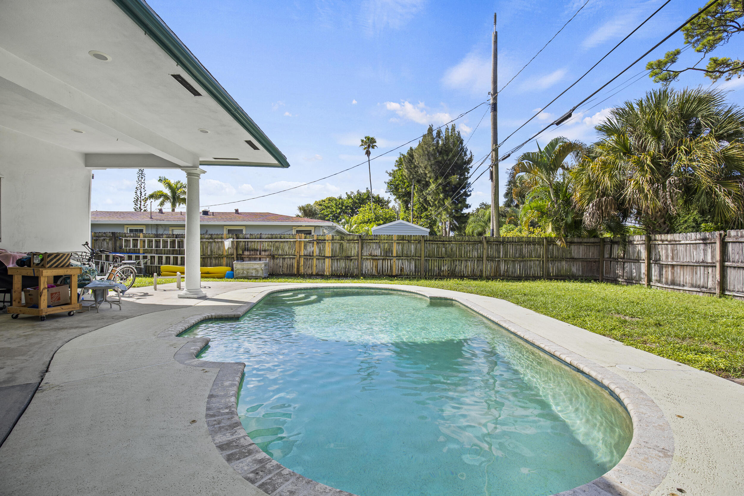 333 Masters Road Palm Springs, FL 33461 - Photo 7 of 15 a view of outdoor space and swimming pool