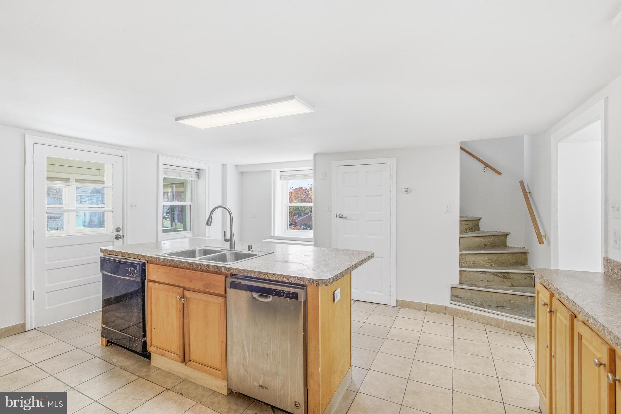 1834 Meetinghouse Road, Unit 1458 Upper Chichester, PA 19061 - Photo 17 of 42 a view of a kitchen with sink cabinets and appliances
