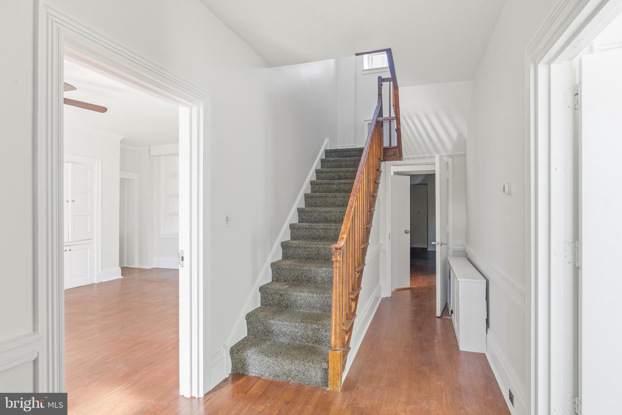 1834 Meetinghouse Road, Unit 1458 Upper Chichester, PA 19061 - Photo 25 of 42 a view of a hallway with wooden floor and entryway