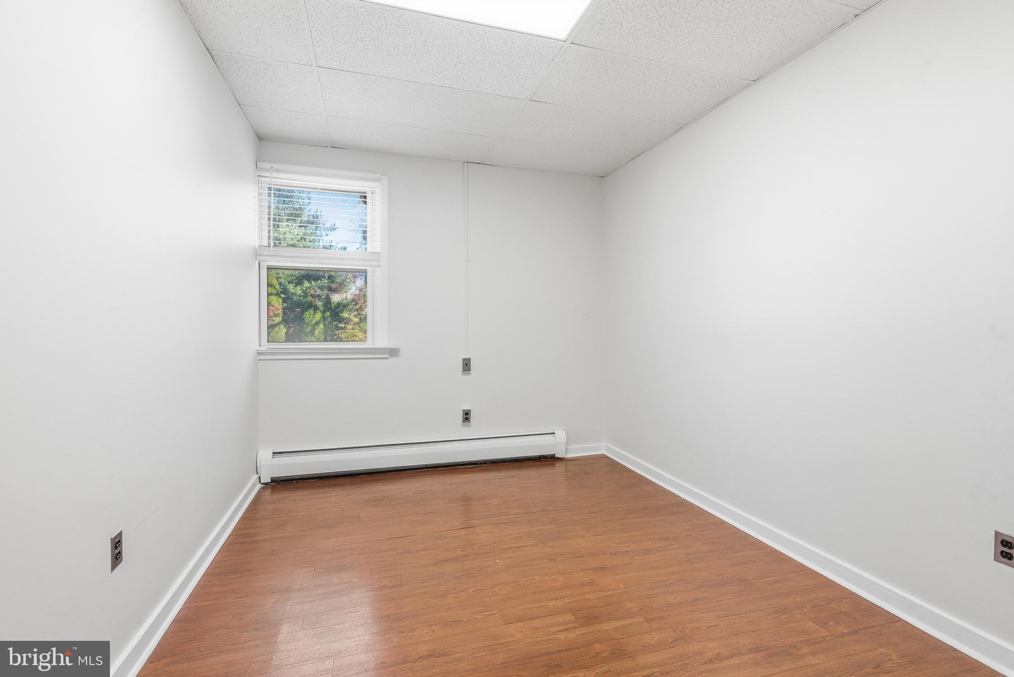 1834 Meetinghouse Road, Unit 1458 Upper Chichester, PA 19061 - Photo 30 of 42 an empty room with a window