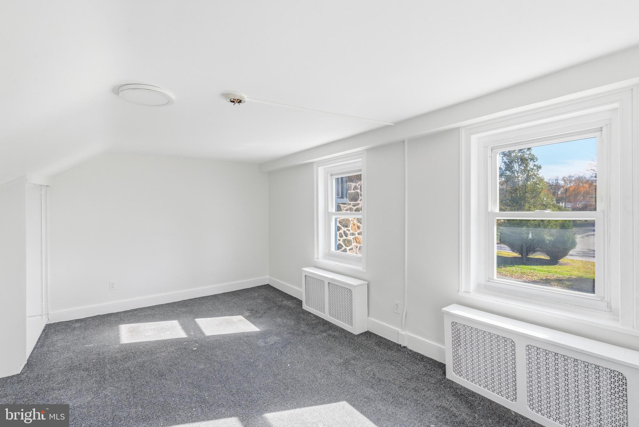 1834 Meetinghouse Road, Unit 1458 Upper Chichester, PA 19061 - Photo 34 of 42 a view of an empty room with a window
