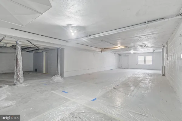 a view of a room with an empty space