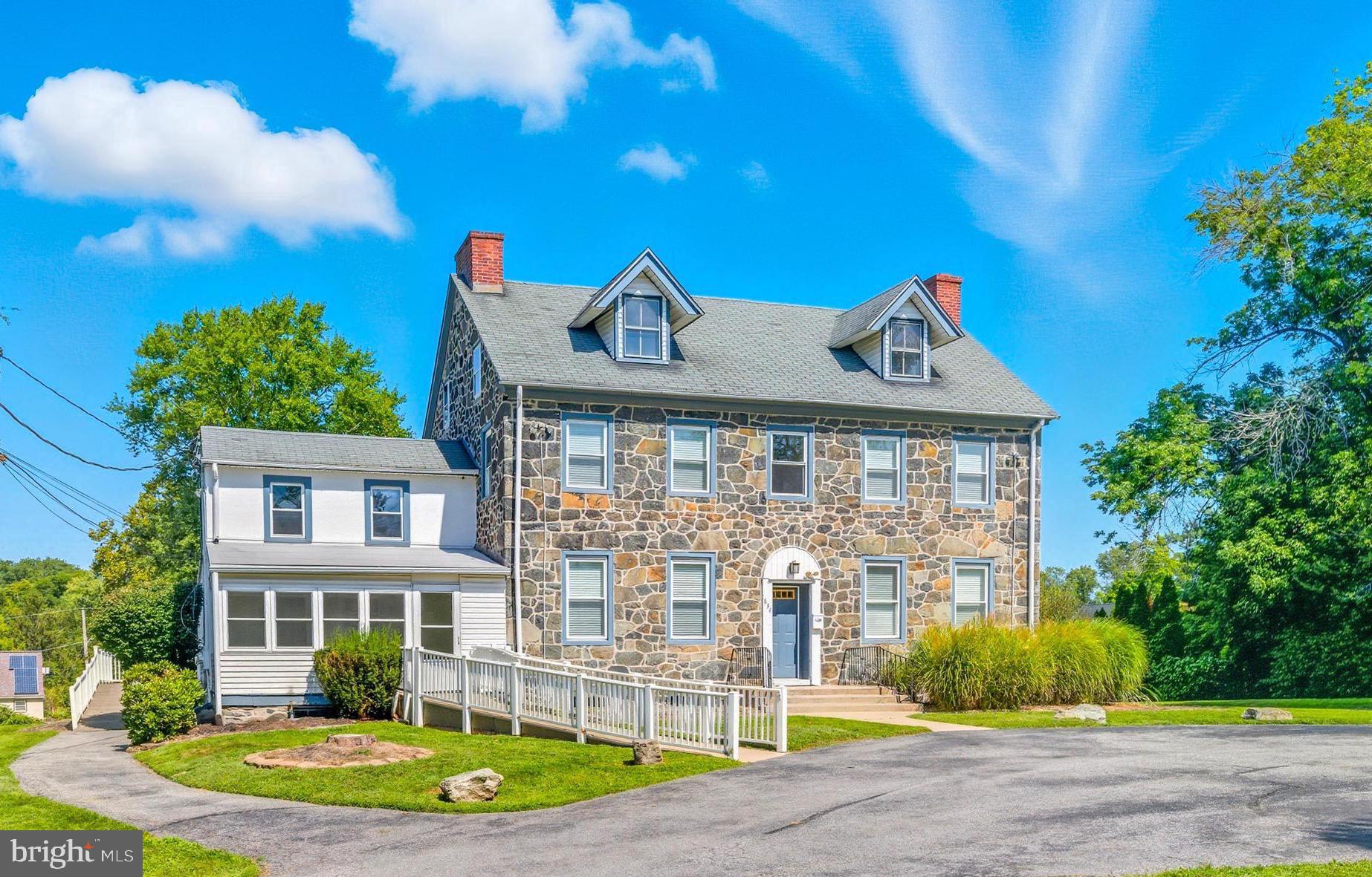 1834 Meetinghouse Road, Unit 1458 Upper Chichester, PA 19061 - Photo 42 of 42 a front view of a house with a yard