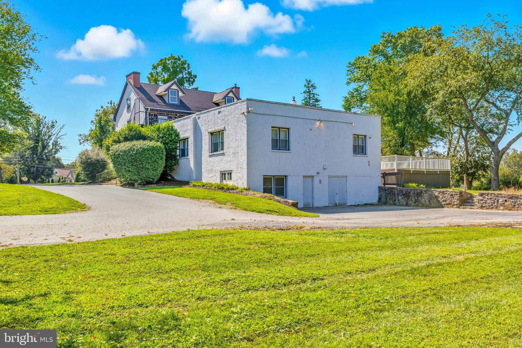 1834 Meetinghouse Road, Unit 1458 Upper Chichester, PA 19061 - Photo 7 of 42 a view of a house with swimming pool and a yard
