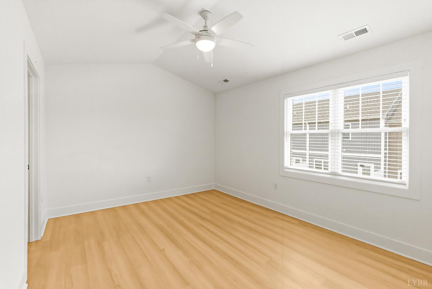 556 Leesville Road, Unit 406 Lynchburg, VA 24502 - Photo 22 of 39 a view of an empty room with a window