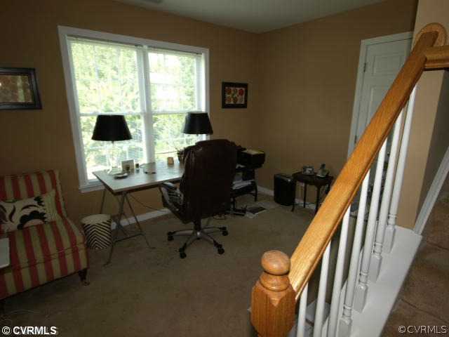 1326 Gravity Hill Road Midlothian, VA 23114 - Photo 11 of 12 a view of a workspace with furniture and a window