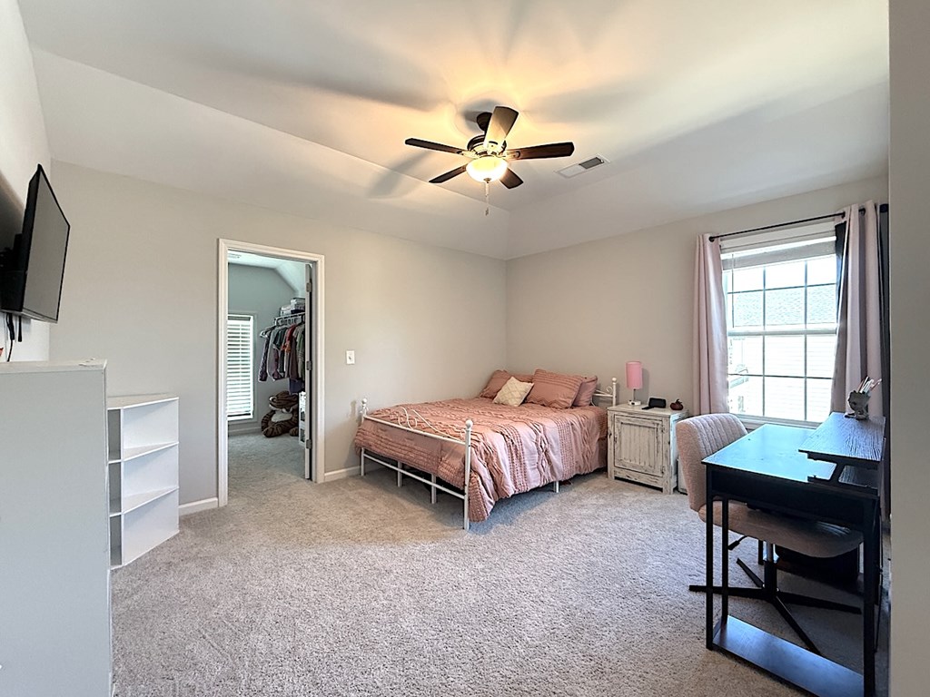 27 Sugar Maple Drive Fort Mitchell, AL 36856 - Photo 18 of 28 a bed room with a bed and a tv
