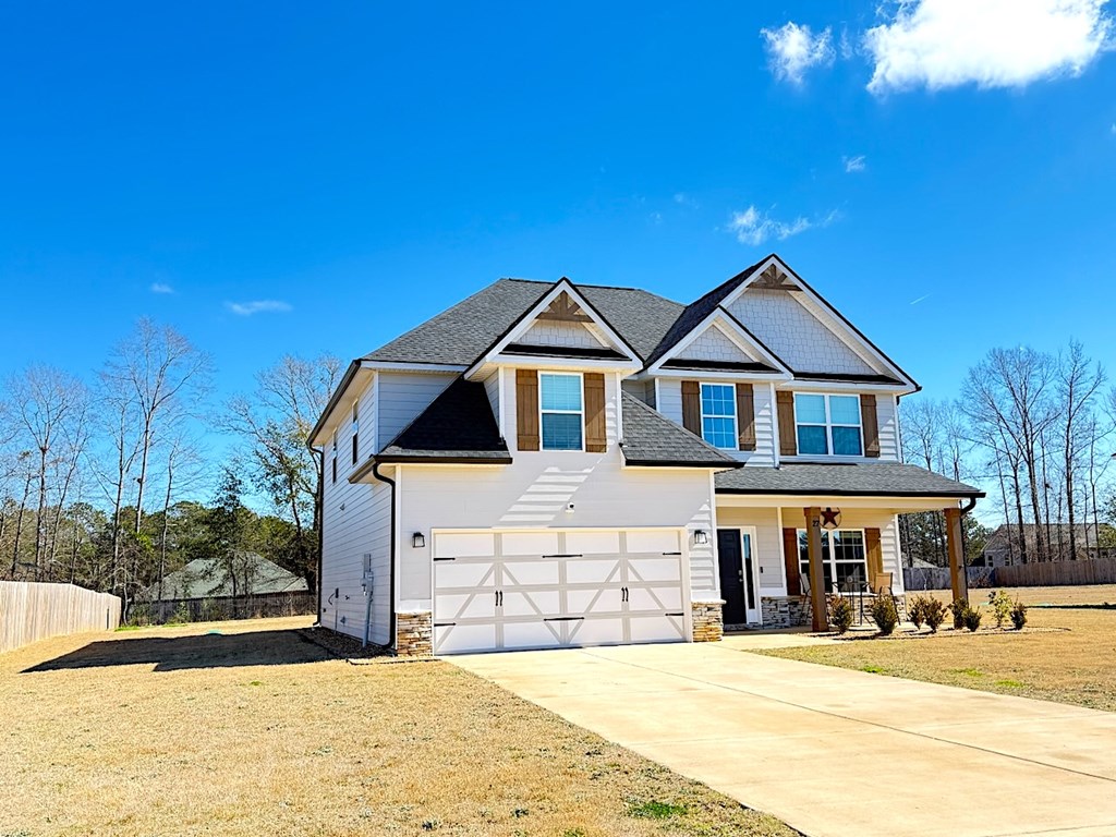 27 Sugar Maple Drive Fort Mitchell, AL 36856 - Photo 2 of 28 a front view of a house with a yard