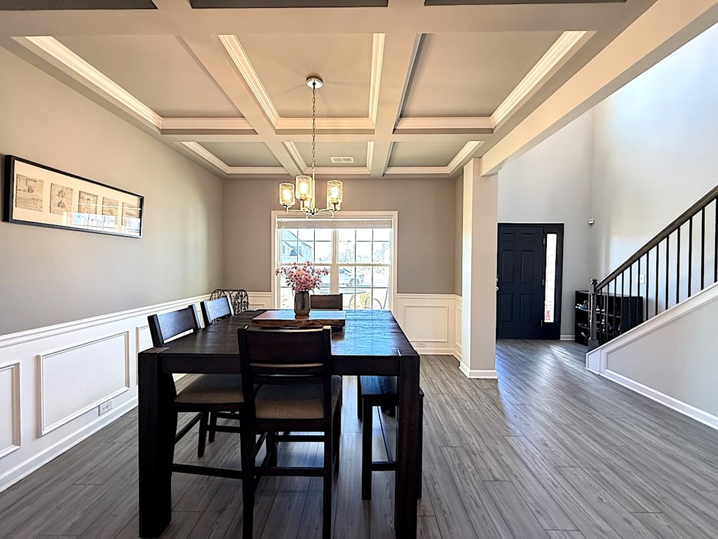 27 Sugar Maple Drive Fort Mitchell, AL 36856 - Photo 5 of 28 a view of a dining room with furniture window and wooden floor