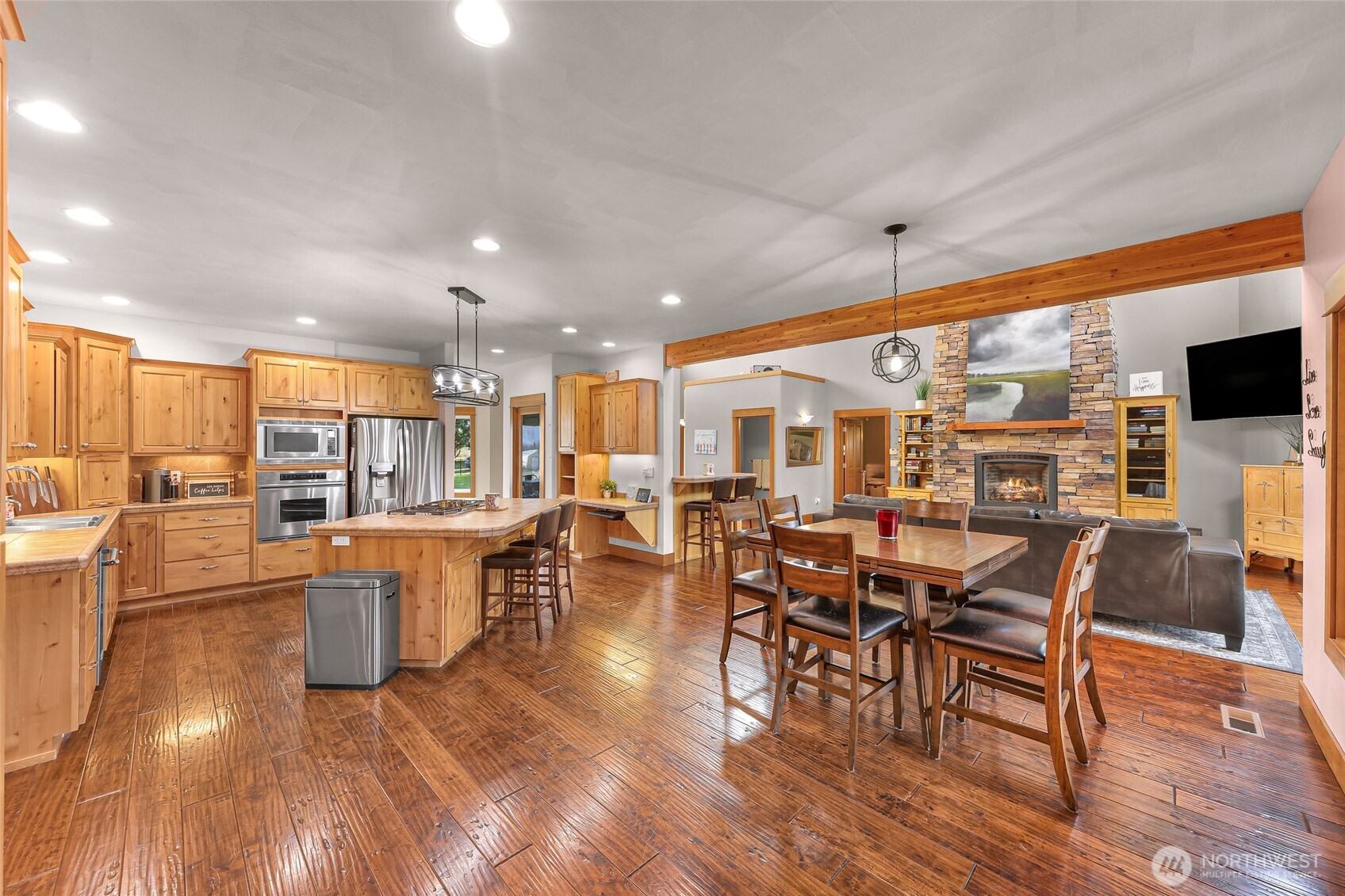 7067 Yukon Way Ferndale, WA 98248 - Photo 11 of 40 an outdoor space with lots of furniture and wooden floor