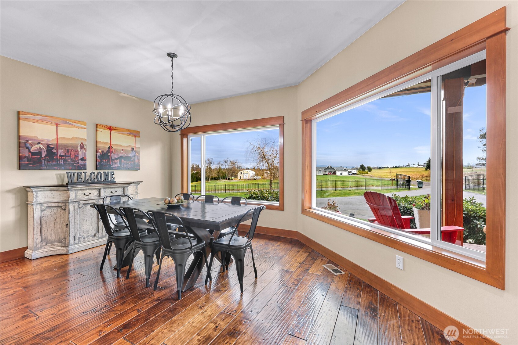 7067 Yukon Way Ferndale, WA 98248 - Photo 12 of 40 a view of a dining room with furniture window and wooden floor