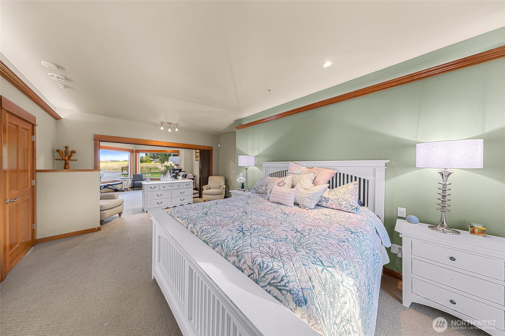 7067 Yukon Way Ferndale, WA 98248 - Photo 17 of 40 a spacious bedroom with a large bed and dresser