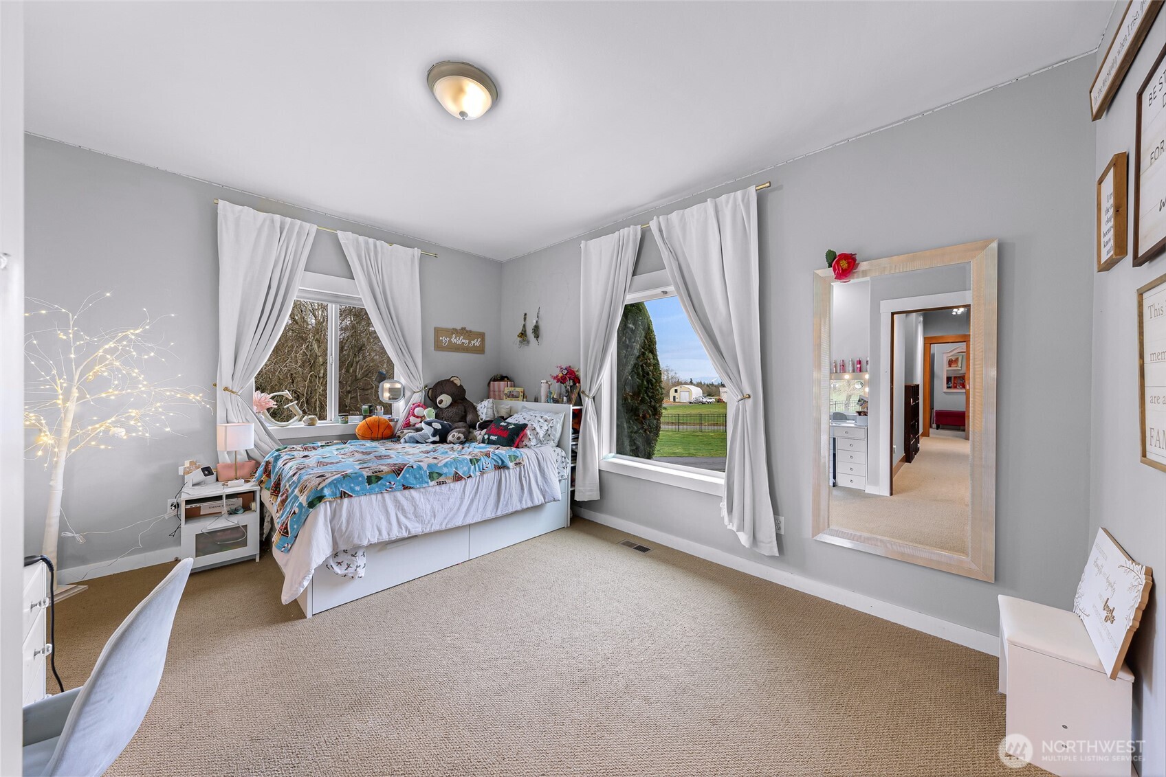 7067 Yukon Way Ferndale, WA 98248 - Photo 21 of 40 a bedroom with furniture and a window