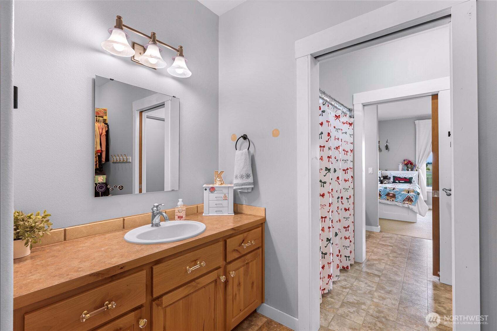 7067 Yukon Way Ferndale, WA 98248 - Photo 23 of 40 a bathroom with a sink double vanity and shower