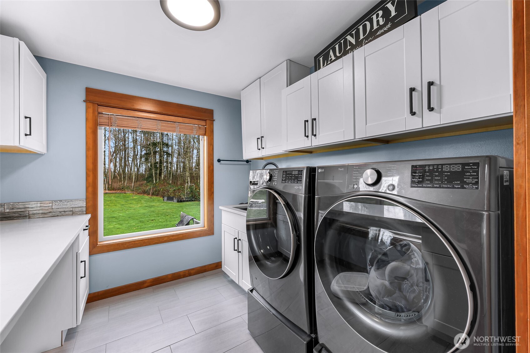 7067 Yukon Way Ferndale, WA 98248 - Photo 25 of 40 a utility room with sink dryer and washer
