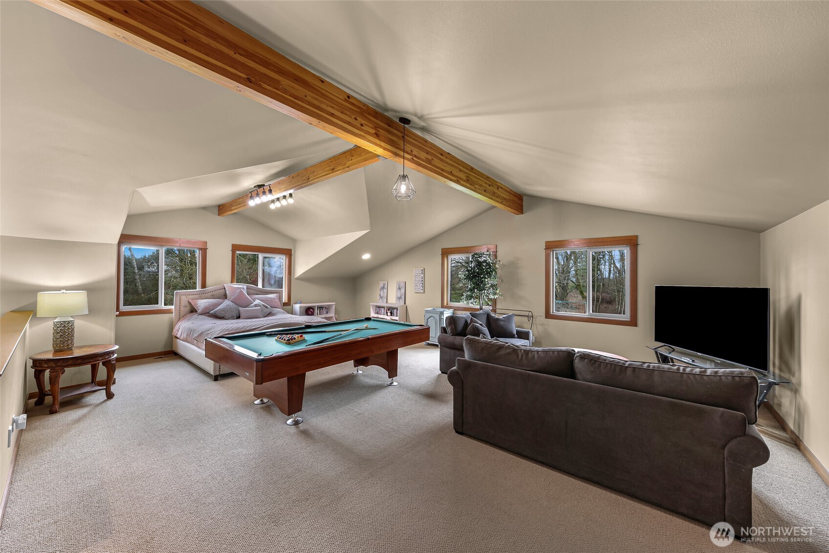 7067 Yukon Way Ferndale, WA 98248 - Photo 27 of 40 a living room with furniture and a flat screen tv