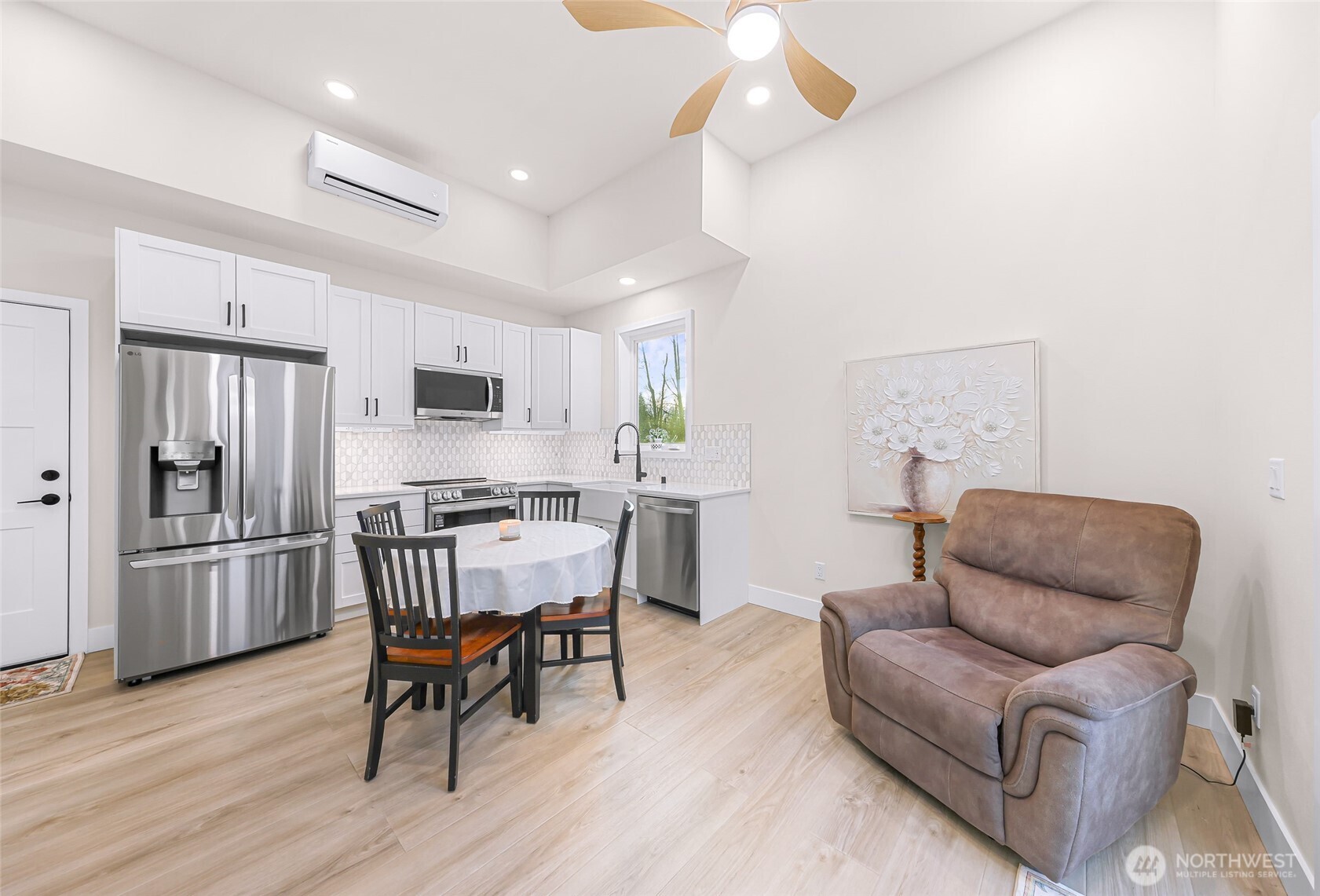 7067 Yukon Way Ferndale, WA 98248 - Photo 30 of 40 a work room with furniture and wooden floor