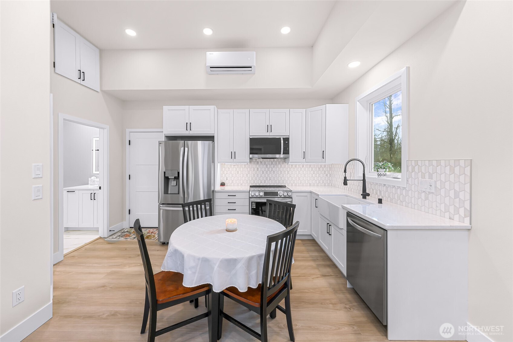 7067 Yukon Way Ferndale, WA 98248 - Photo 31 of 40 a large kitchen with a table and chairs