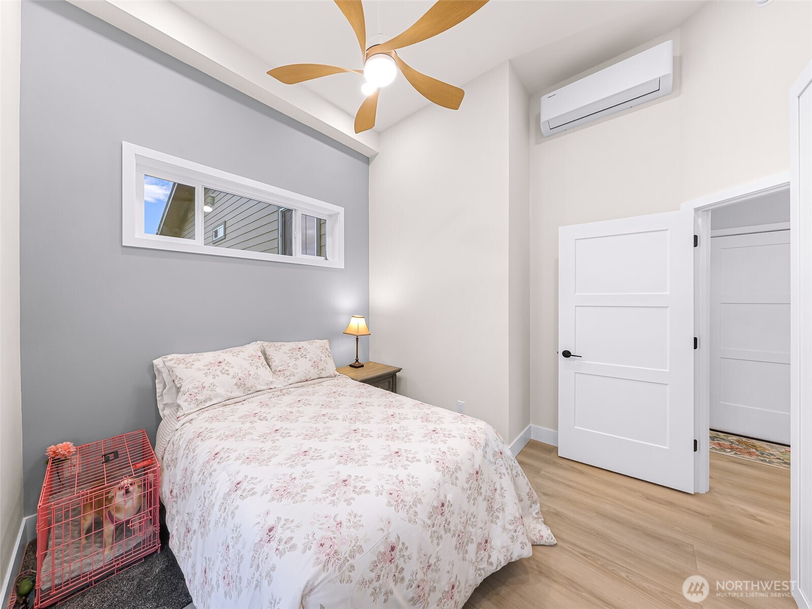 7067 Yukon Way Ferndale, WA 98248 - Photo 33 of 40 a bedroom with a bed and wooden floor