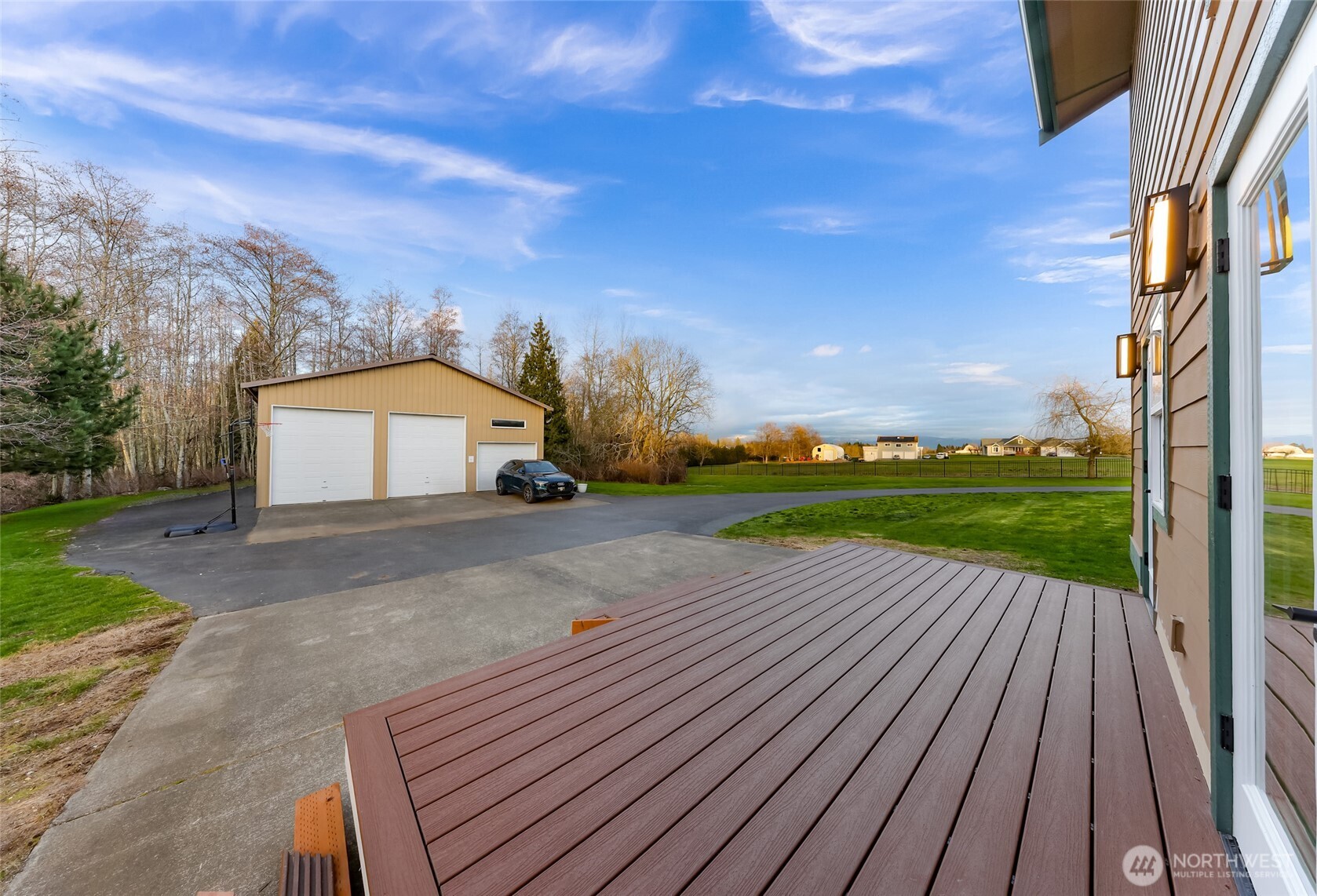7067 Yukon Way Ferndale, WA 98248 - Photo 35 of 40 a view of a house with backyard and garden