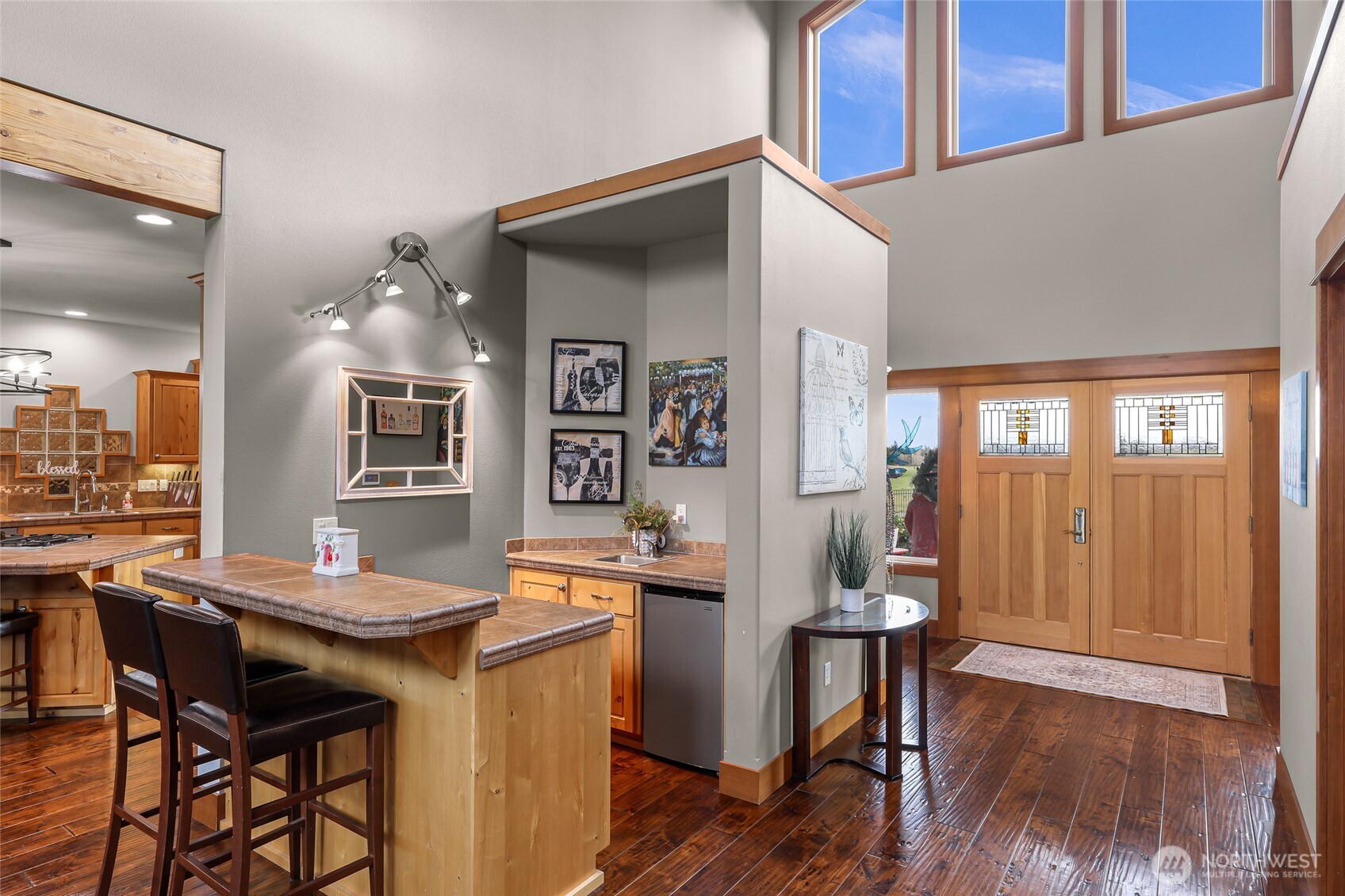 7067 Yukon Way Ferndale, WA 98248 - Photo 8 of 40 a view of a dining room with furniture and wooden floor