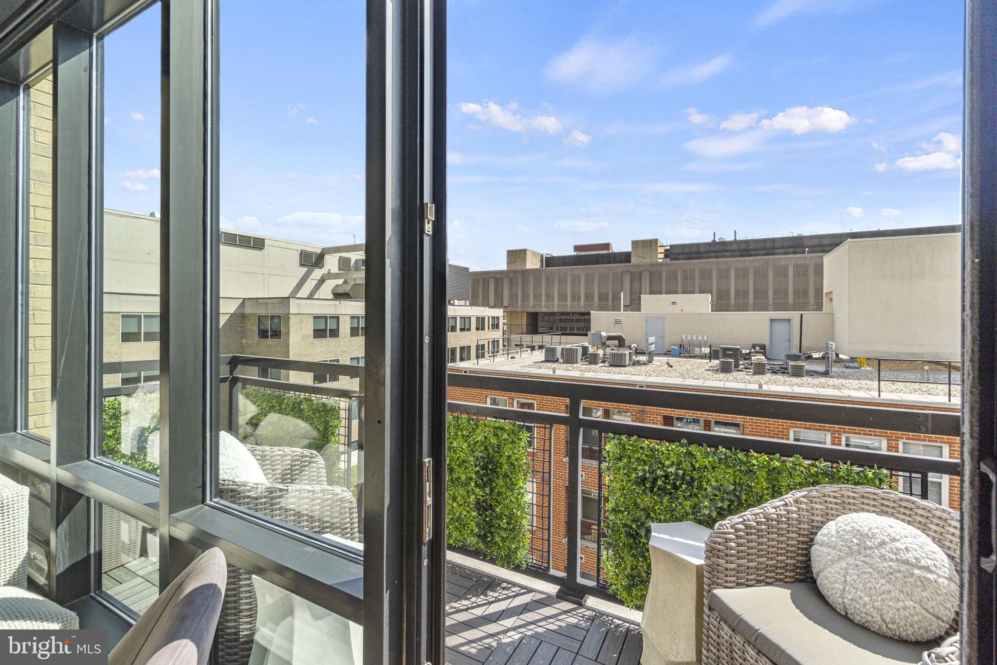 912 F Street Northwest, Unit 1100 Washington, DC 20004 - Photo 6 of 23 a city view from a balcony