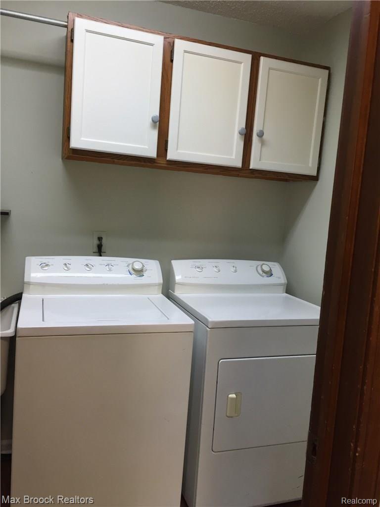 21990 River Ridge Trail, Unit 70 Farmington, MI 48335 - Photo 13 of 27 First floor Laundry Room