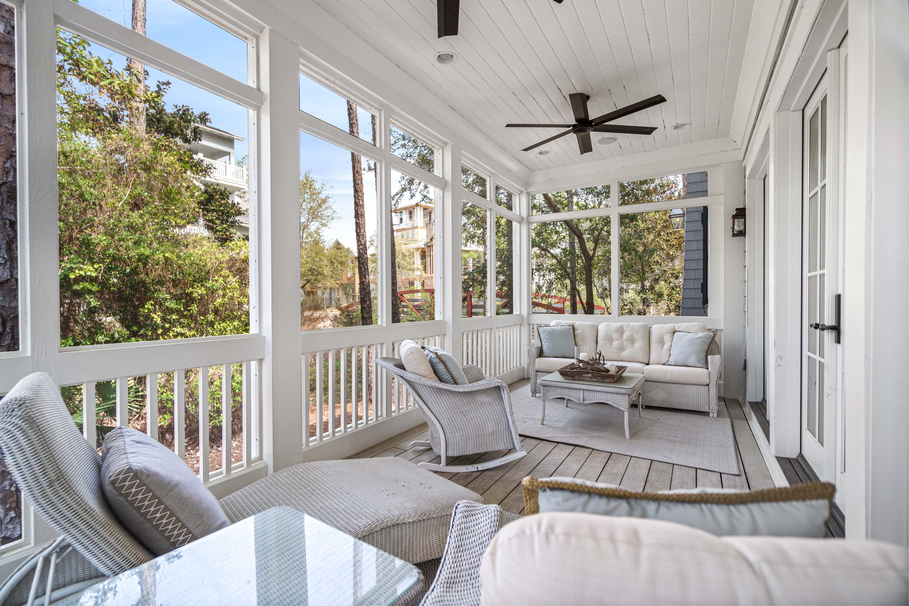 8 Shingle Lane Watersound, FL 32461 - Photo 26 of 73 a living room with furniture and a large window