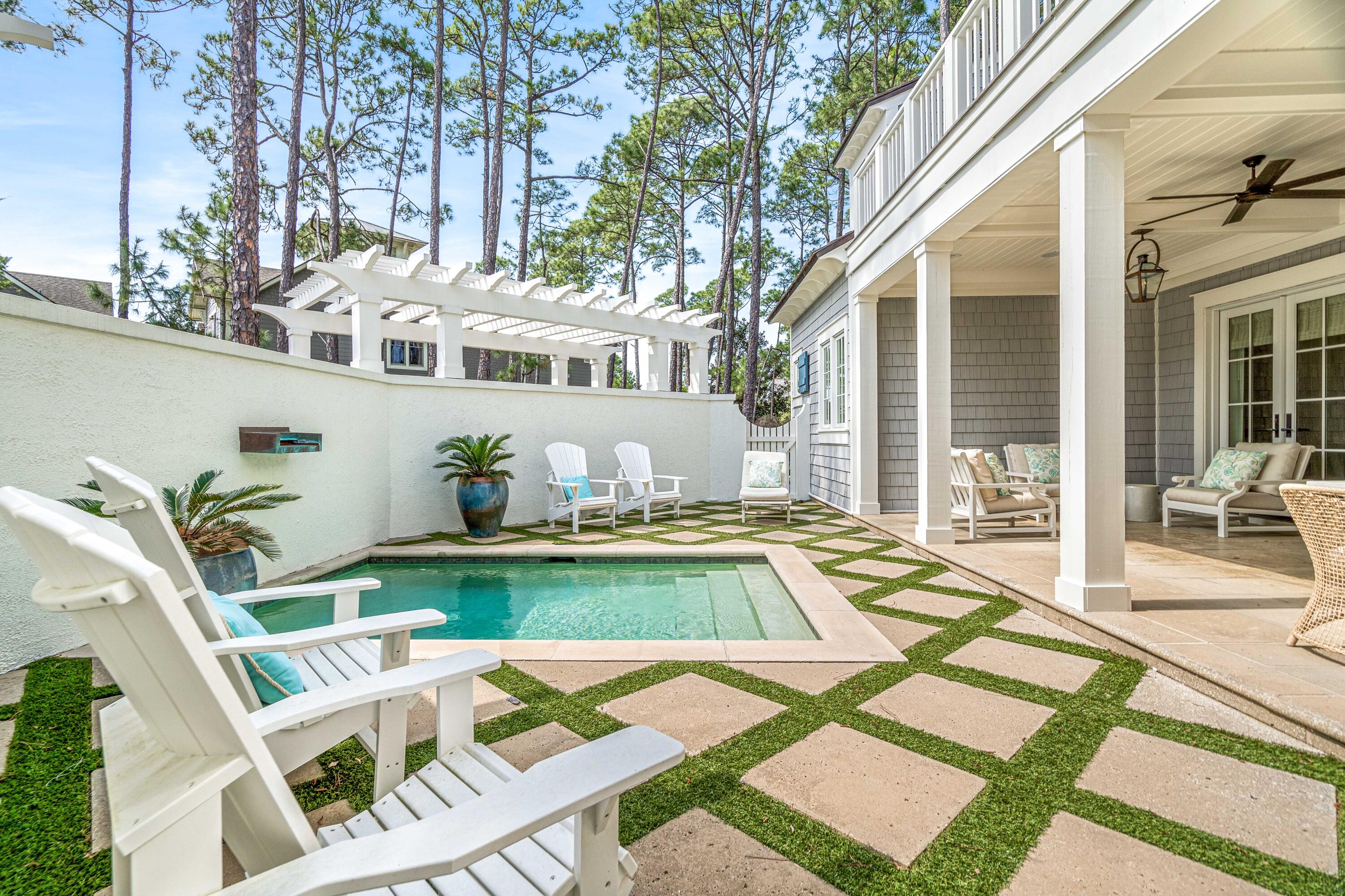 8 Shingle Lane Watersound, FL 32461 - Photo 3 of 73 a front view of a house with swimming pool having outdoor seating