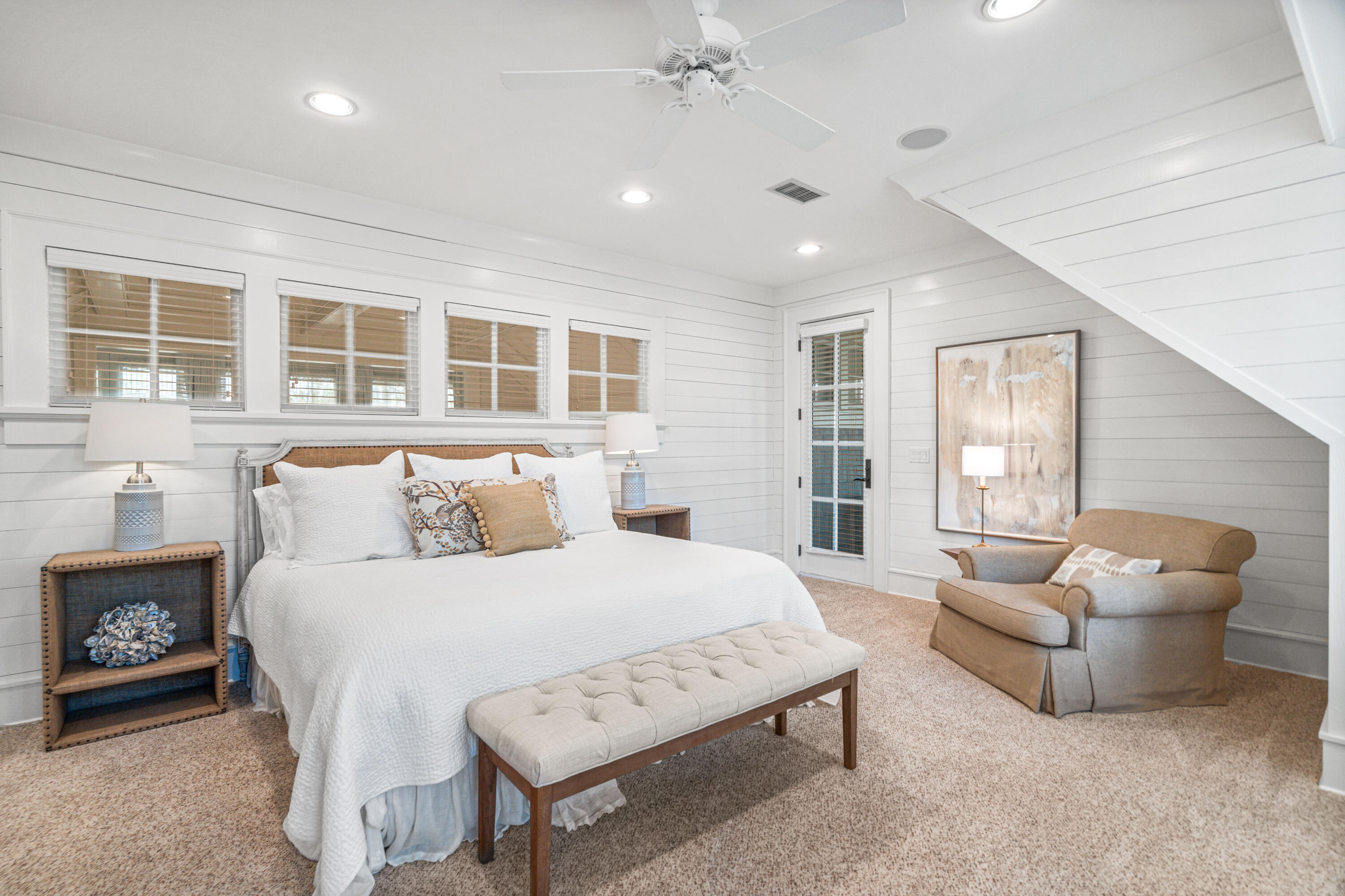 8 Shingle Lane Watersound, FL 32461 - Photo 40 of 73 a spacious bedroom with a bed and glass window