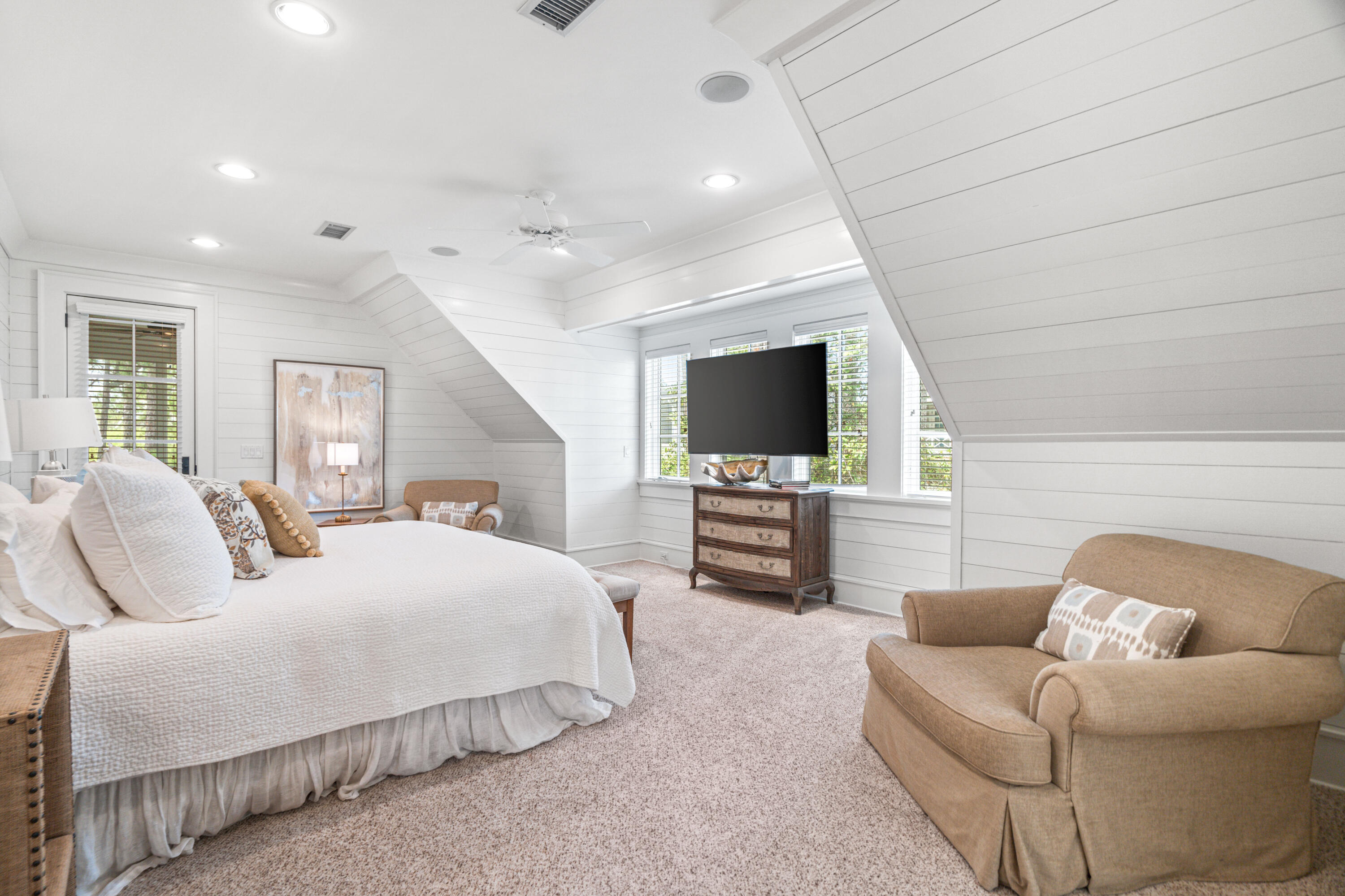 8 Shingle Lane Watersound, FL 32461 - Photo 41 of 73 a bedroom with a bed and a flat screen tv